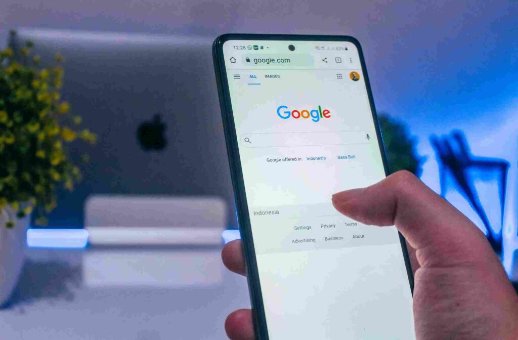 Mobile search on the Google homepage representing Google Ads and mobile advertising solutions by SEO Pro Star Agency.